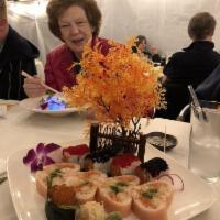 Mom Rules Roll · Shrimp tempura, spicy tuna & seaweed salad, wrapped in a pink soy paper rolled into a heart ...