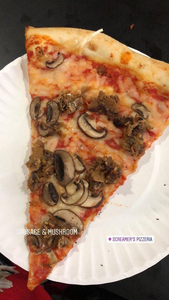 Sausage and Mushrooms Pizza · Tomato sauce, house made seitan sausage, crimini mushrooms and vegan cheese. Vegan.
