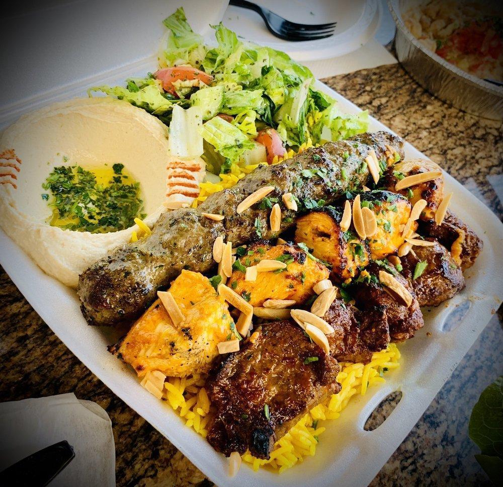 Combo Plate · Grilled and served with hummus, rice, salad and fresh bread.