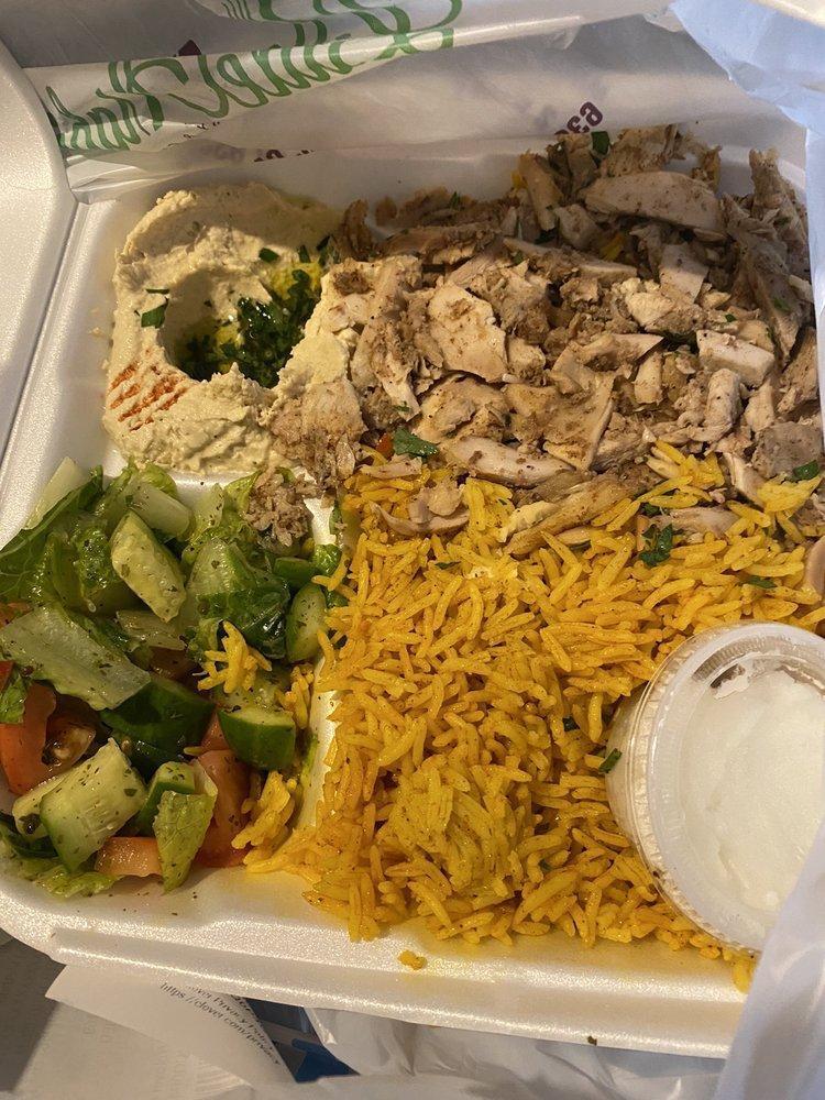 Chicken Shawarma Plate · Roasted marinated chicken served with fries or rice, garlic paste, pickles, salad and fresh bread.