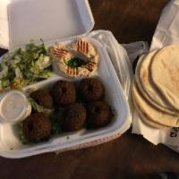 Falafel Plate · Broad beans, chick peas, mixed with herbs, garlic, onion and spices, served with humus or ta...