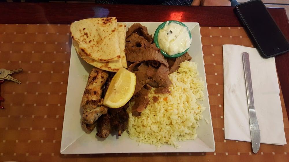 Combination Plate · Served with Greek salad, pita bread, tzatzikI and choice of french fries, rice or lemon potatoes. Pork and chicken souvlakI and gyro.