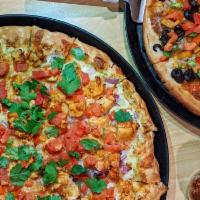Chicken Pizza Masala · Inspired by the classic chicken tikka masala, made with tender chicken, red onions, tomatoes...