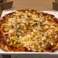 Mango Monsoon Pizza · Mangoes, bell peppers and red onions showered with a medley of Indian chutneys and spices on...