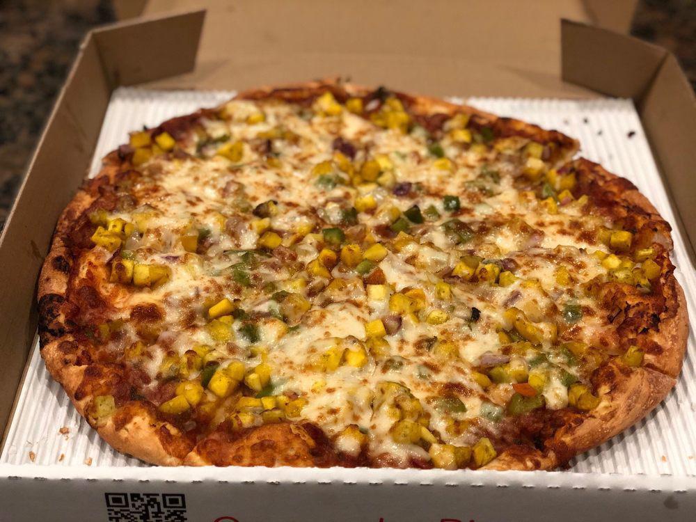 Mango Monsoon Pizza · Mangoes, bell peppers and red onions showered with a medley of Indian chutneys and spices on our slow cooked curry sauce. Comes with premium cheese.