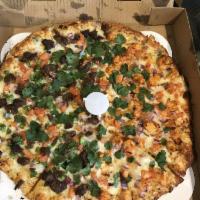 Spicy Gyro Pizza · Tender masala lamb, red onions ,bell peppers, tomatoes and fresh cilantro on a creamy garlic...