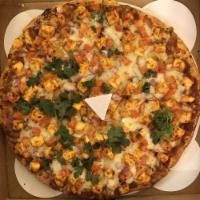 Tandoorilicious Pizza · Red onions, bell peppers, tomatoes and fresh cilantro with your choice of chicken, peneer or...