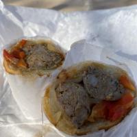 Ray's Sausage Sandwich · Comes with peppers and onion.