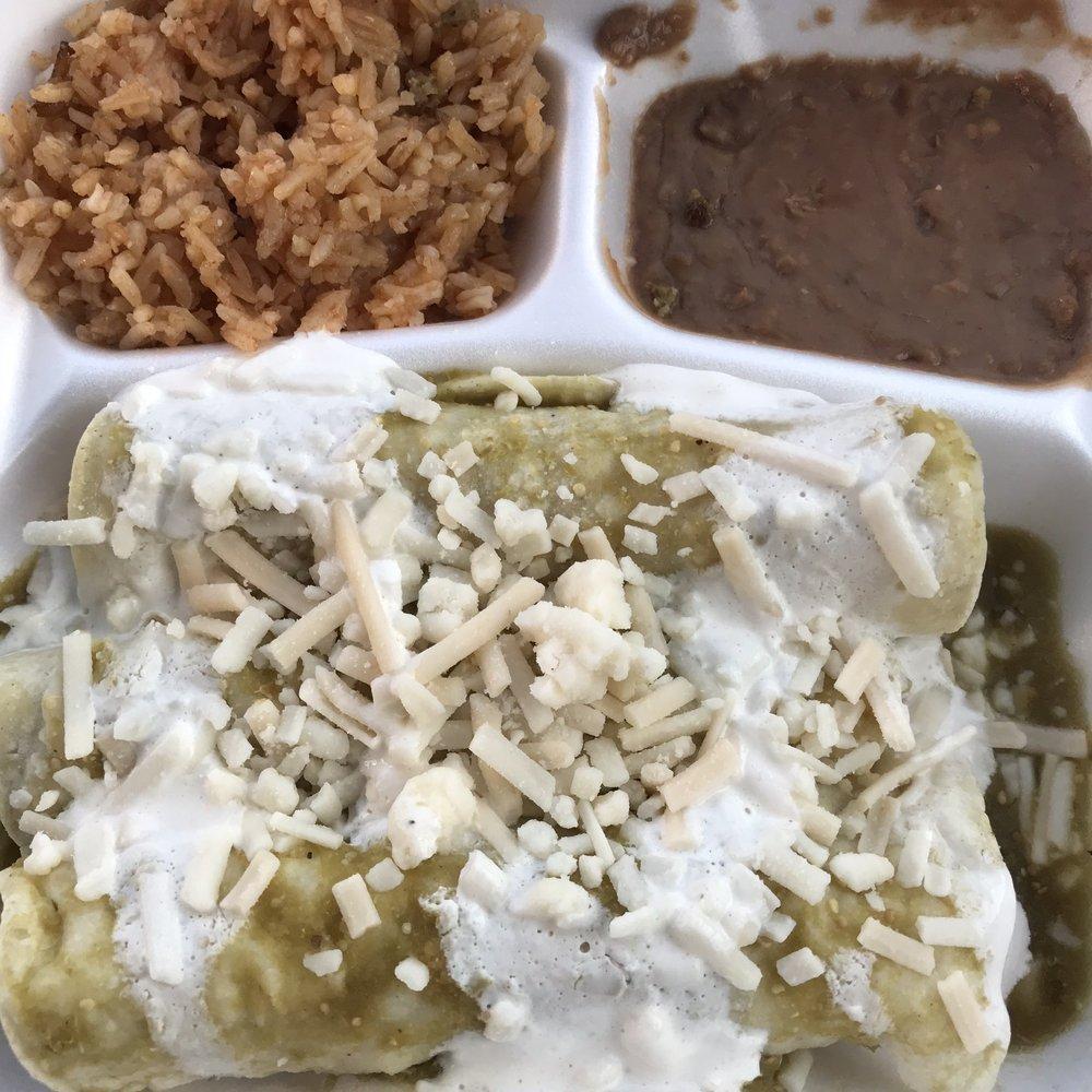 Green Enchilada · Choice of vegan meat, sour cream, cheese, covered in green salsa. Served with rice and beans. Gluten free.
