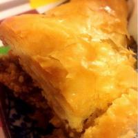 Baklava · Rich, sweet dessert pastry made of layers of filo filled with chopped nuts and sweetened and...