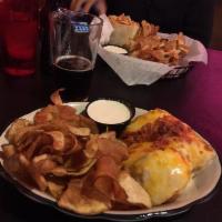 Hot Brown Sandwich · Fresh turkey covered with melted cheese, Alfredo, and topped with bacon bit. Served on a lar...