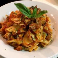 Pappardelle Fra Diavolo · Hand-cut pasta and spicy marinara with eggplant 2-ways.
