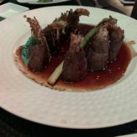Beef Negimaki · New York sirloin sliced and rolled with enoki mushrooms and green onions. Served with a swee...