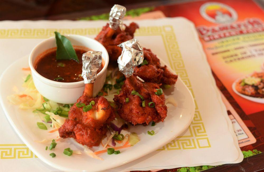 4 Pieces Chicken Lollipop · Chicken drumsticks marinated in spices, coated in zesty batter and deep fried.