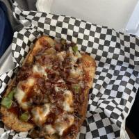 Smoked Brisket Melt · Smoked chopped brisket, grilled onions, bell peppers, hickory smoked bacon with white americ...