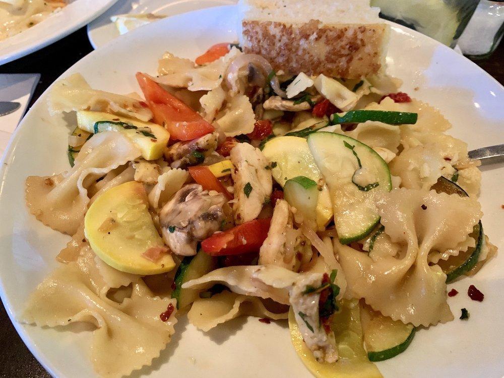 Chicken Primavera · Sliced chicken, zucchini, yellow squash, sugar snap peas, red peppers, tomatoes, mushrooms, onions, Kalamata olives, garlic, red pepper flakes, fresh basil, Asiago cheese and lemon garlic butter with bow tie pasta.