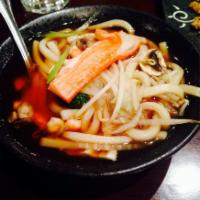 Seafood Udon · Noodle in clear fish stock with assorted seafood one shrimp tempura and egg.