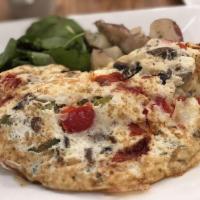 Spicy Wild Mushroom Omelette · Swiss cheese, sauteed mushrooms, homemade roasted red peppers, jalapeno.