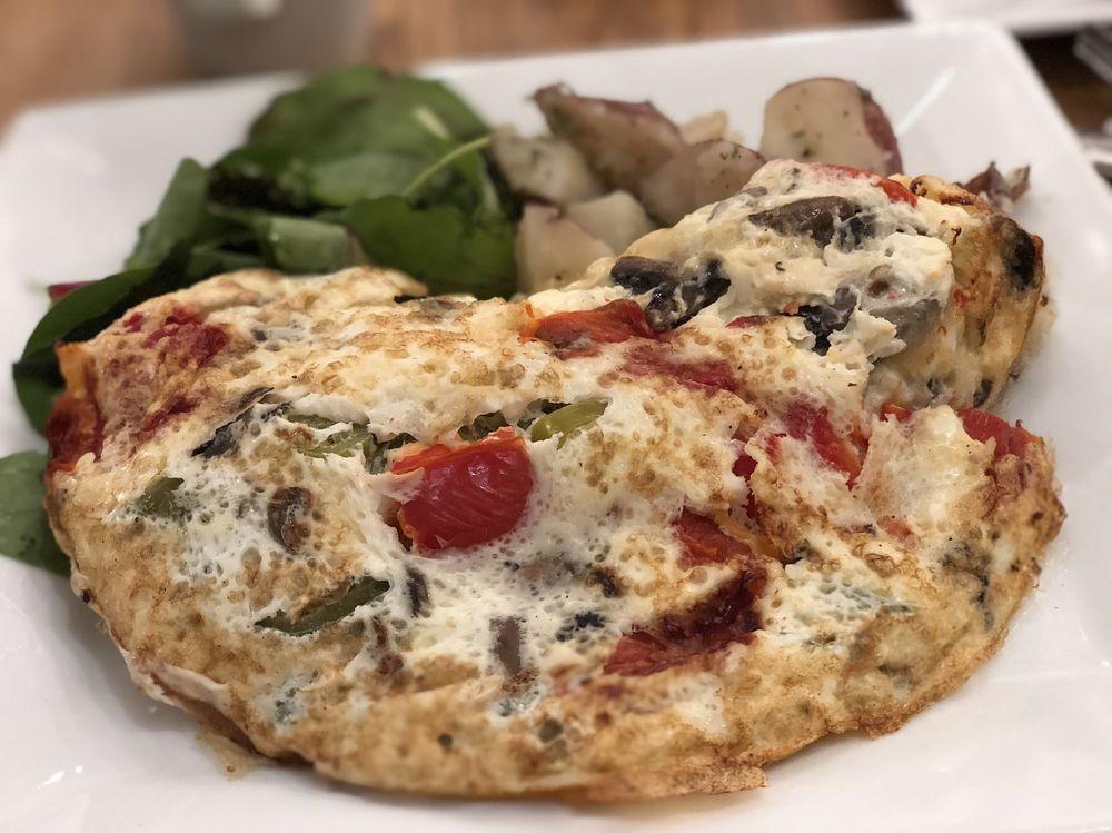 Spicy Wild Mushroom Omelette · Swiss cheese, sauteed mushrooms, homemade roasted red peppers, jalapeno.