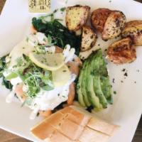 Eggs Benjamin · Sautéed spinach, smocked salmon, two poached eggs