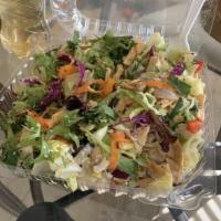 Asian Salad · Iceberg, spring mix, red cabbage, chicken, carrots, wonton strips, almonds, red bell peppers...
