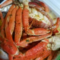 Seafood Platter · 8oz lobster, 2 snow crab cluster, 13 shrimp, potatoes, corn, boiled egg and a sausage