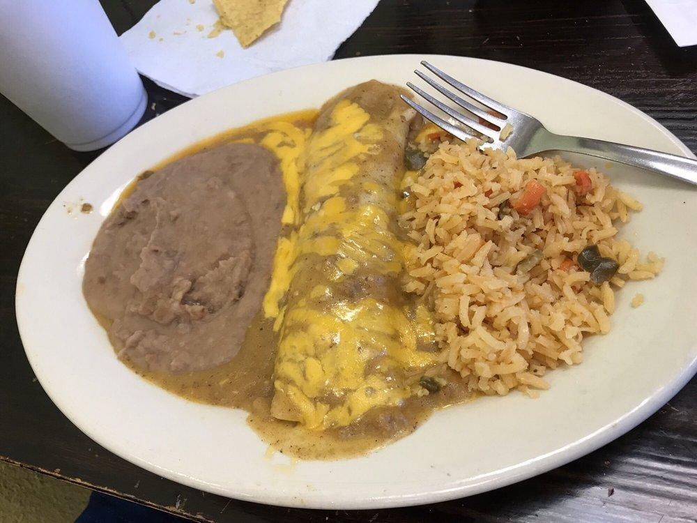 Kids Enchilada Plate · 1 tex-mex cheese enchilada served with rice and beans. Served with small soft drink.