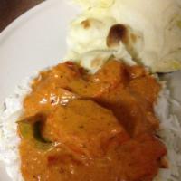 Chicken Tikka Masala · Chicken breast cooked with onions and bell peppers in onion based tomato creamy sauce. Serve...