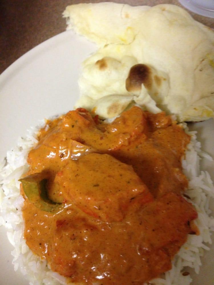 Chicken Tikka Masala · Chicken breast cooked with onions and bell peppers in onion based tomato creamy sauce. Served with basmati rice.