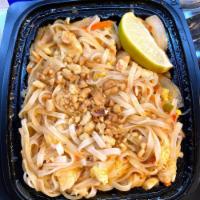 Pad Thai · Flat rice noodles with shrimp, chicken and egg with crushed peanuts.