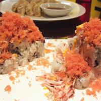 Volcano Roll · Salmon, tuna, avocado inside with spicy lobster and spicy crab on the top.