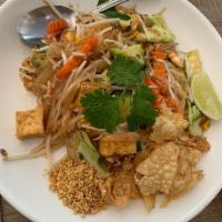 Old School Pad Thai · Rice vermicelli, house tamarind sauce, fresh bean sprouts, green onion and crushed peanuts. ...