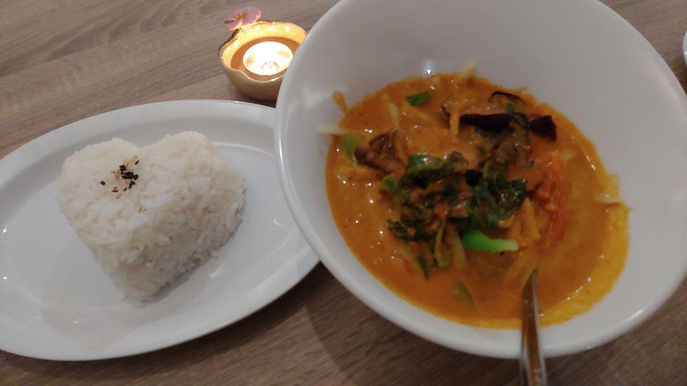 Pumpkin Curry · Pumpkin, eggplant, bell peppers, bamboo shoots and fresh basil in a red curry sauce. Vegan.