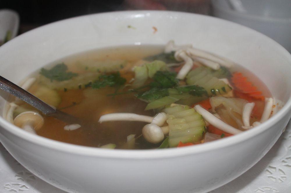 Tom Yum Soup · Thai hot and sour soup with tofu, mushroom and mixed, vegetables, flavored with lemongrass, and fresh lime juice 