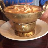 Red Curry · Red curry paste in cream of coconut, bell peppers, pineapples, bamboo shoot, eggplant and fr...