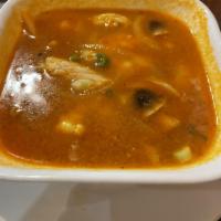 Tom Yum Soup · Thai hot and sour soup with mushrooms flavored with lemongrass.