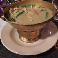 Green Curry · Thai green curry paste, coconut milk, eggplants slices, green bean, bell pepper and Thai swe...