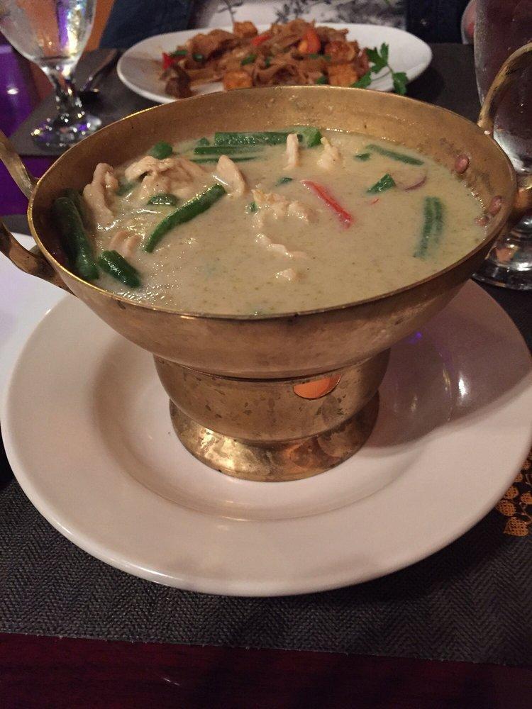 Green Curry · Thai green curry paste, coconut milk, eggplants slices, green bean, bell pepper and Thai sweet basil.