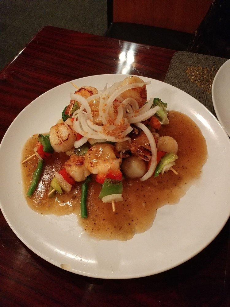 Grilled Shrimp and Scallop · Served with fresh mixed vegetables and seasoned with garlic sauce.