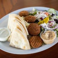 Falafel Platter · Vegetarian. Homemade falafel with choice of rice or fries, a Greek salad, pita bread, and tz...