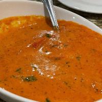 Chicken Tikka Masala · Chicken breast roasted in a tandoor oven, delicately cooked in a spiced tomato and onion-bas...