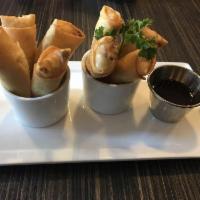 Crispy Spring Roll · Crispy fried rolls stuffed with vegetables and glass noodles.