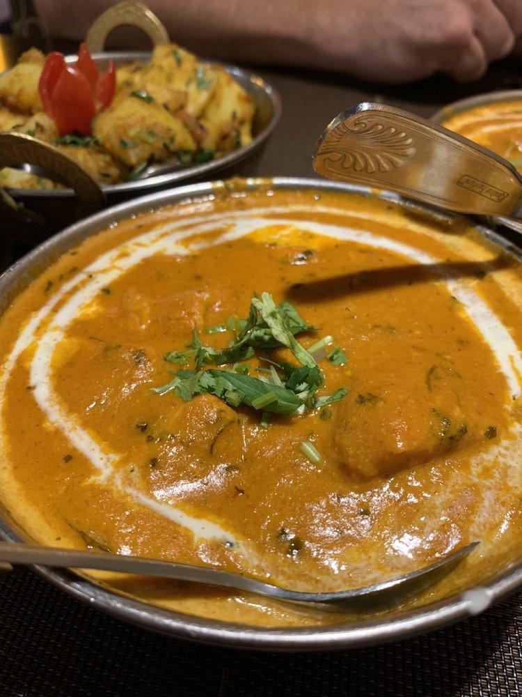 Butter Chicken · White meat in smooth, rich, creamy tomato gravy. Gluten free.

Served with Complimentary White Basmati Rice.