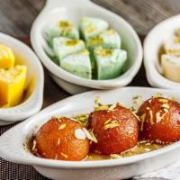 Gulab Jamun · 2pcof Fried milk rounds soaked in sugar syrup.