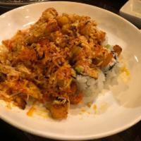 Volcano Roll · California roll topped with baked marinated craw fish and crab meat with spicy mayo and eel ...