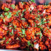 Chicken Tandoori · An Indian favorite! Marinated overnight in yogurt and freshly ground spices and broiled in t...