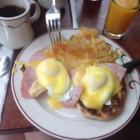 Eggs Benedict · Two poached eggs and Canadian bacon on a toasted English muffin topped with hollandaise sauce.