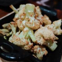 Caramelized Cauliflower · Caramelized cauliflower with toasted pine nuts, crispy mint leaves and lime sauce. Vegetaria...