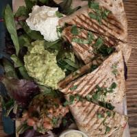 Quesadilla · Comes with melted mozzarella cheese, spring mixed greens, romaine lettuce on whole-wheat tor...