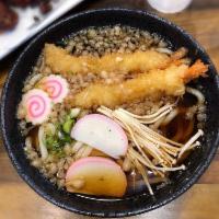 Tempura Udon · Shrimp tempura served over udon soup.